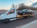 Autolaweta z Audi A8 na pokładzie. Zastanawiasz się, jakie prawo jazdy jest potrzebne do jej prowadzenia?